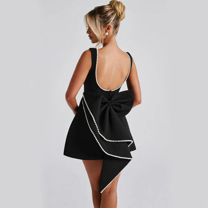 Robe Évasée Élégante – Nœud et Perle