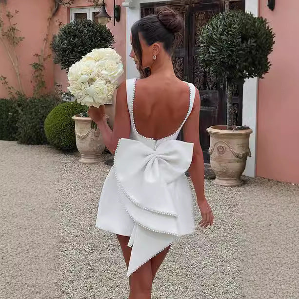 Robe Évasée Élégante – Nœud et Perle